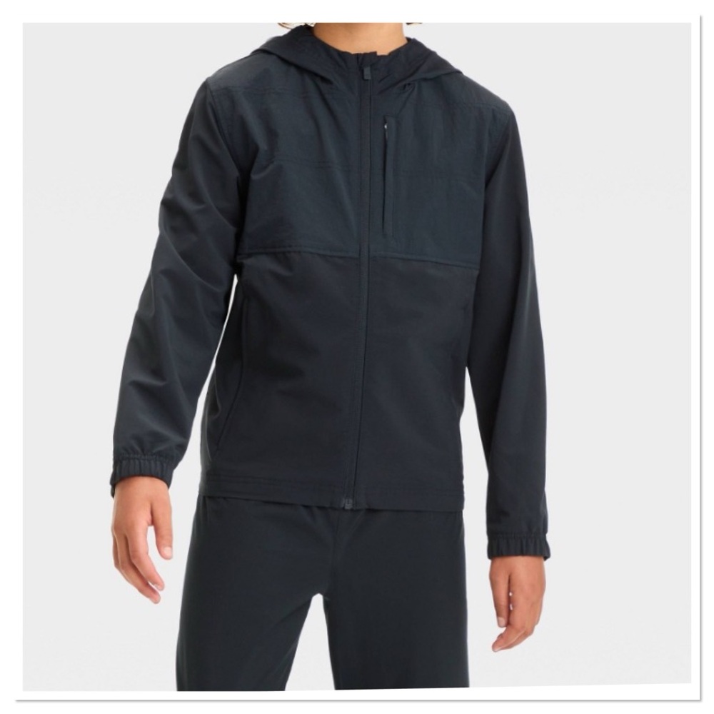 Boy’s Lightweight Black Hooded Jacket all in motion